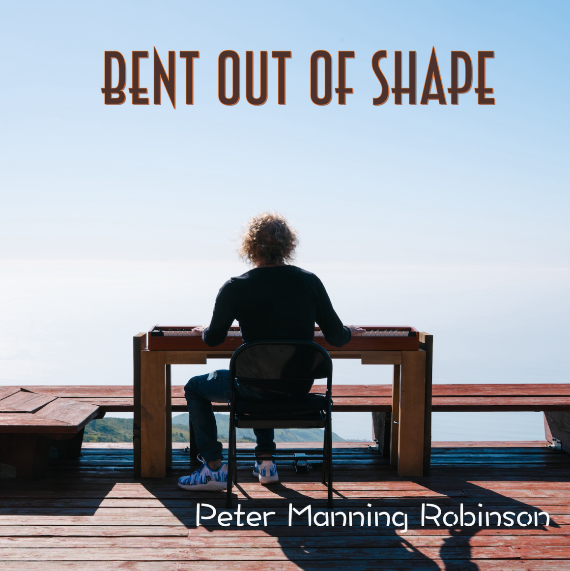 Peter Manning Robinson Finds Joy In The Fracture On “Bent Out of Shape”